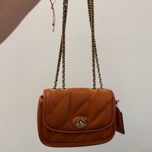 Quilted Pillow Madison
Shoulder Bag 18